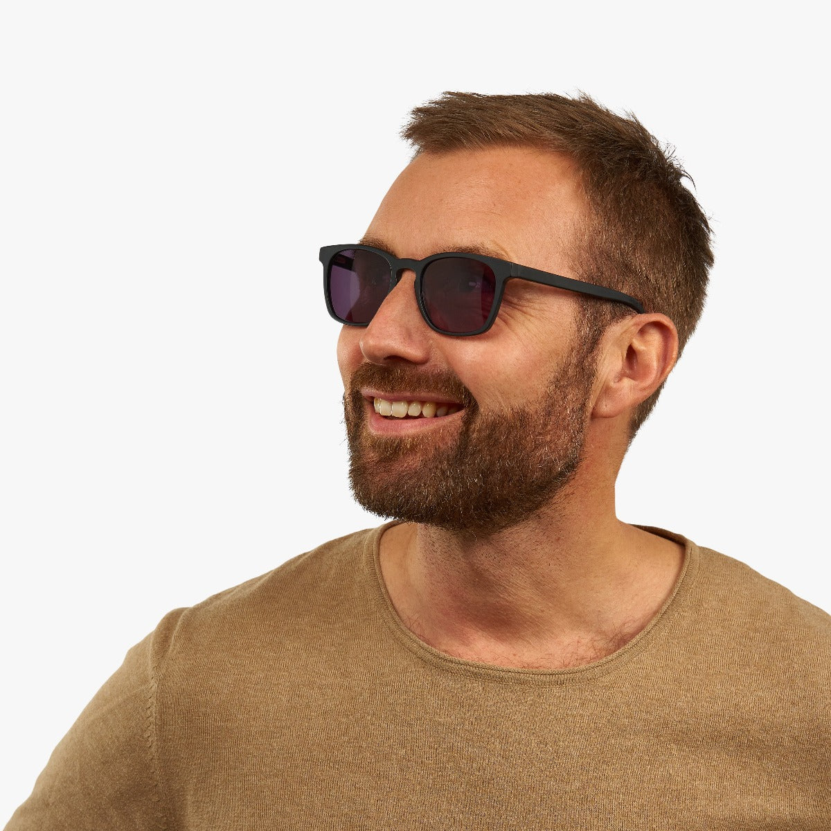 Person wearing Bornholm Black sunglasses