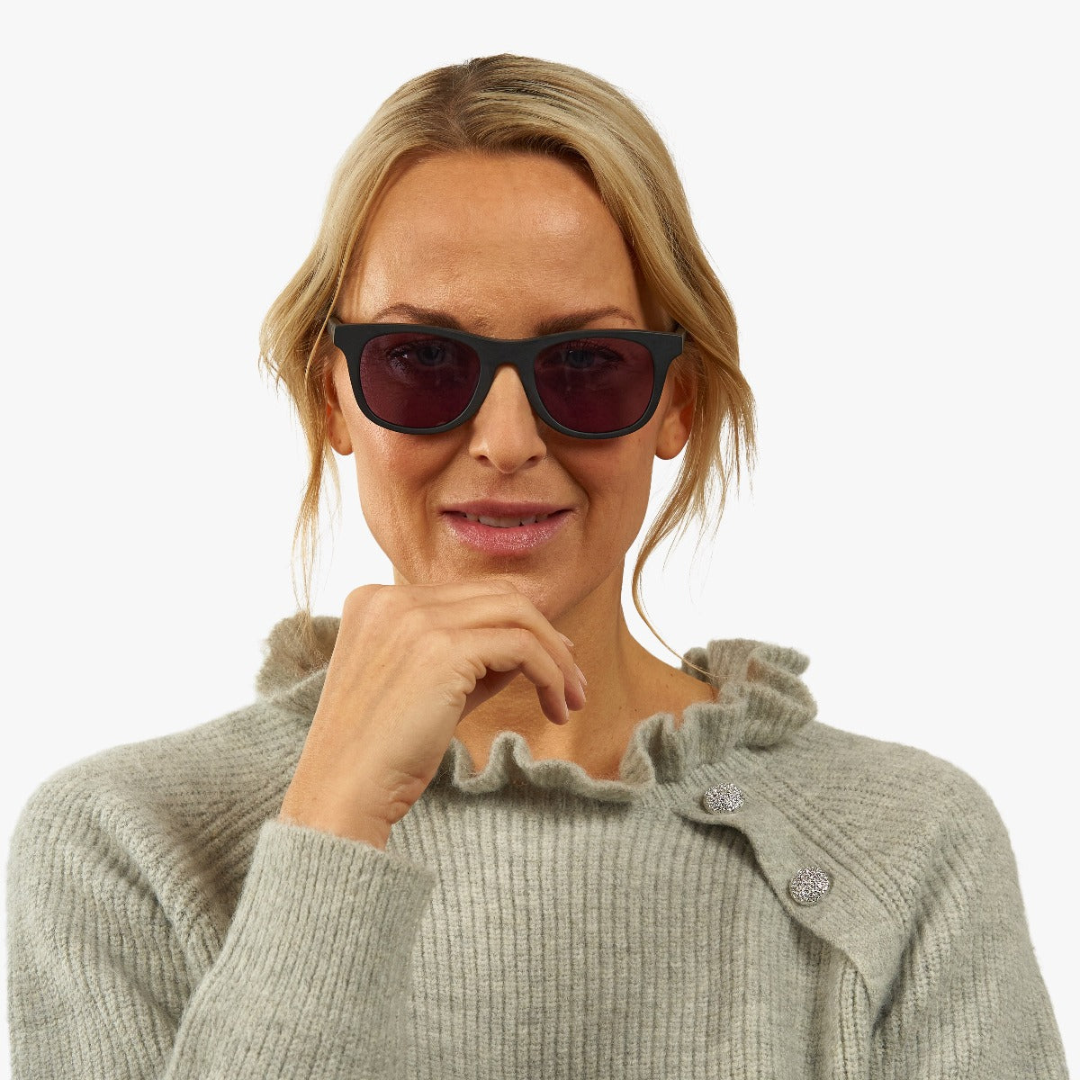 Person wearing Malmö Black sunglasses