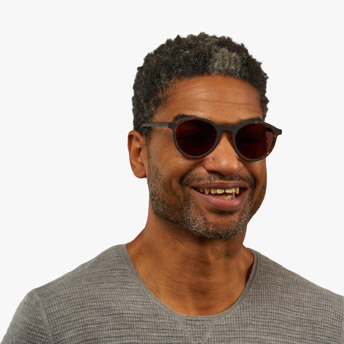 Person wearing Men's Løkken Dark Turtle sunglasses