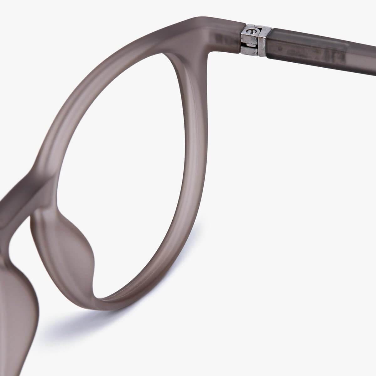 Close-up of grey horn-rimmed glasses hinge detail