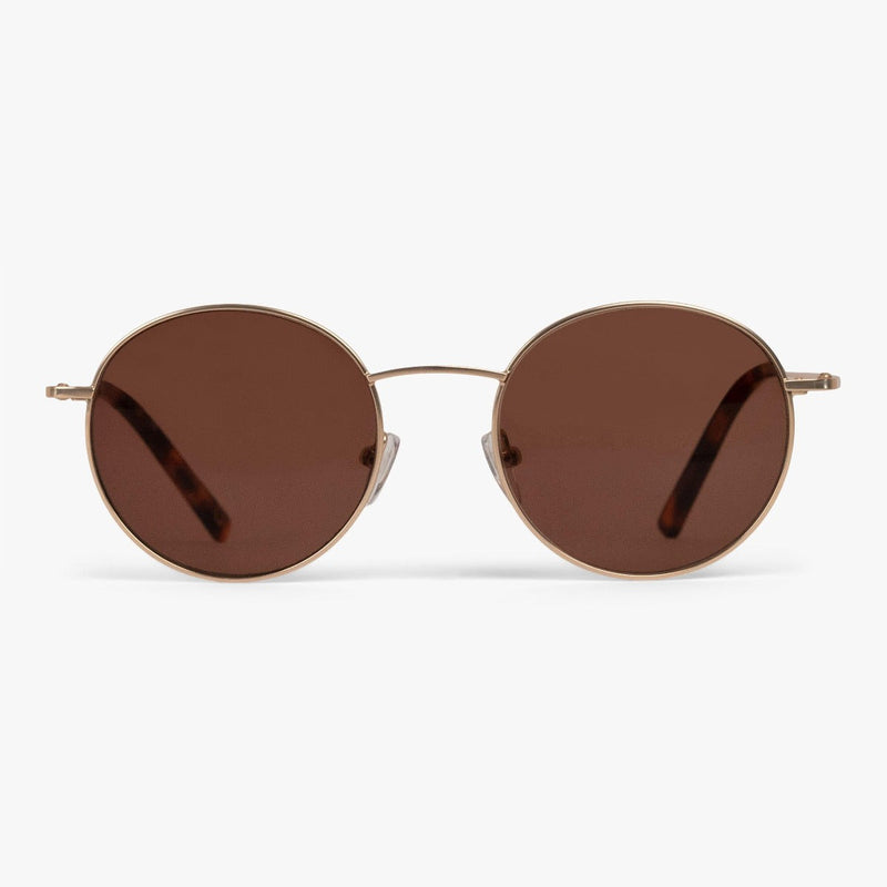 Round brown lenses with gold metal frame and temples