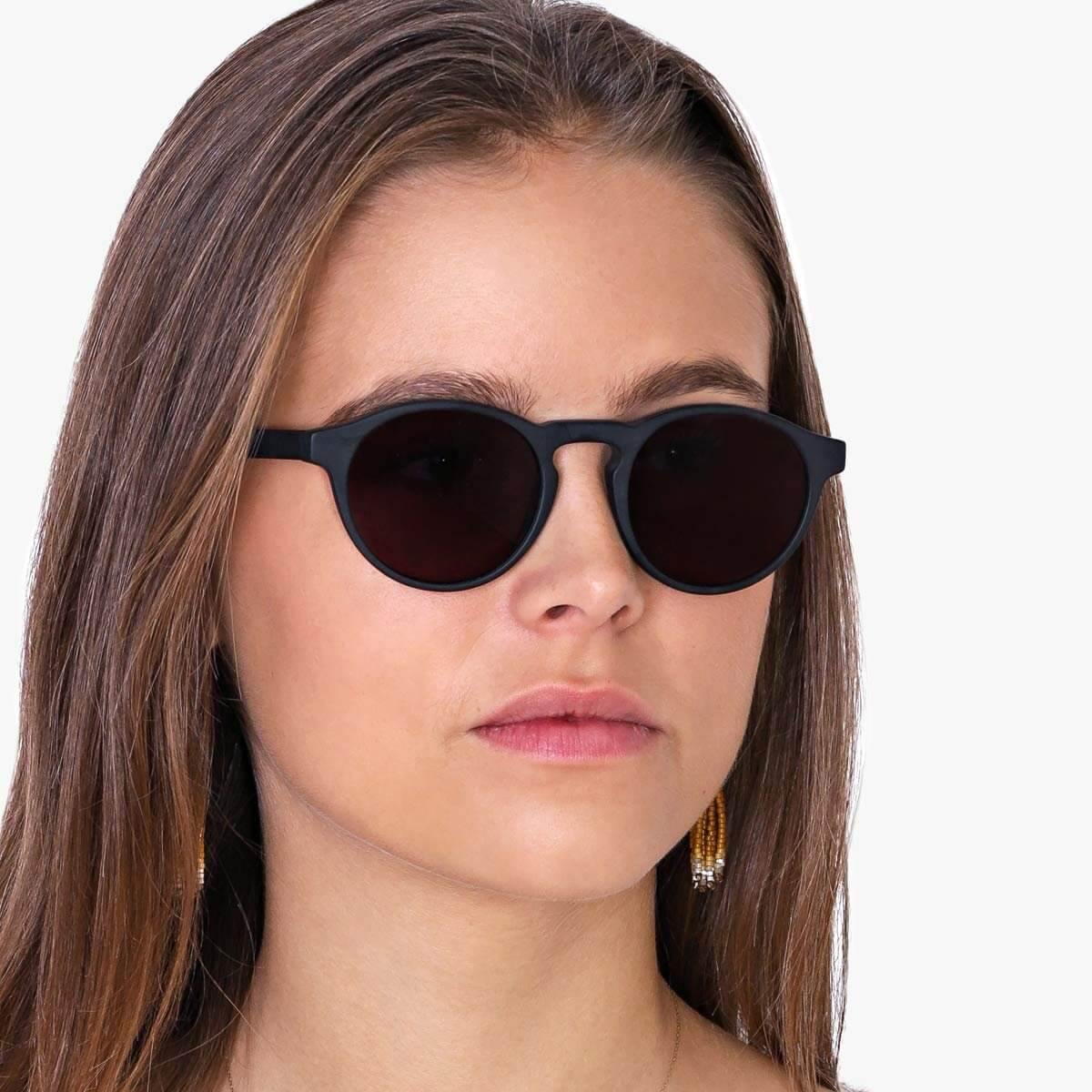 Person wearing Women's Trondheim Black sunglasses