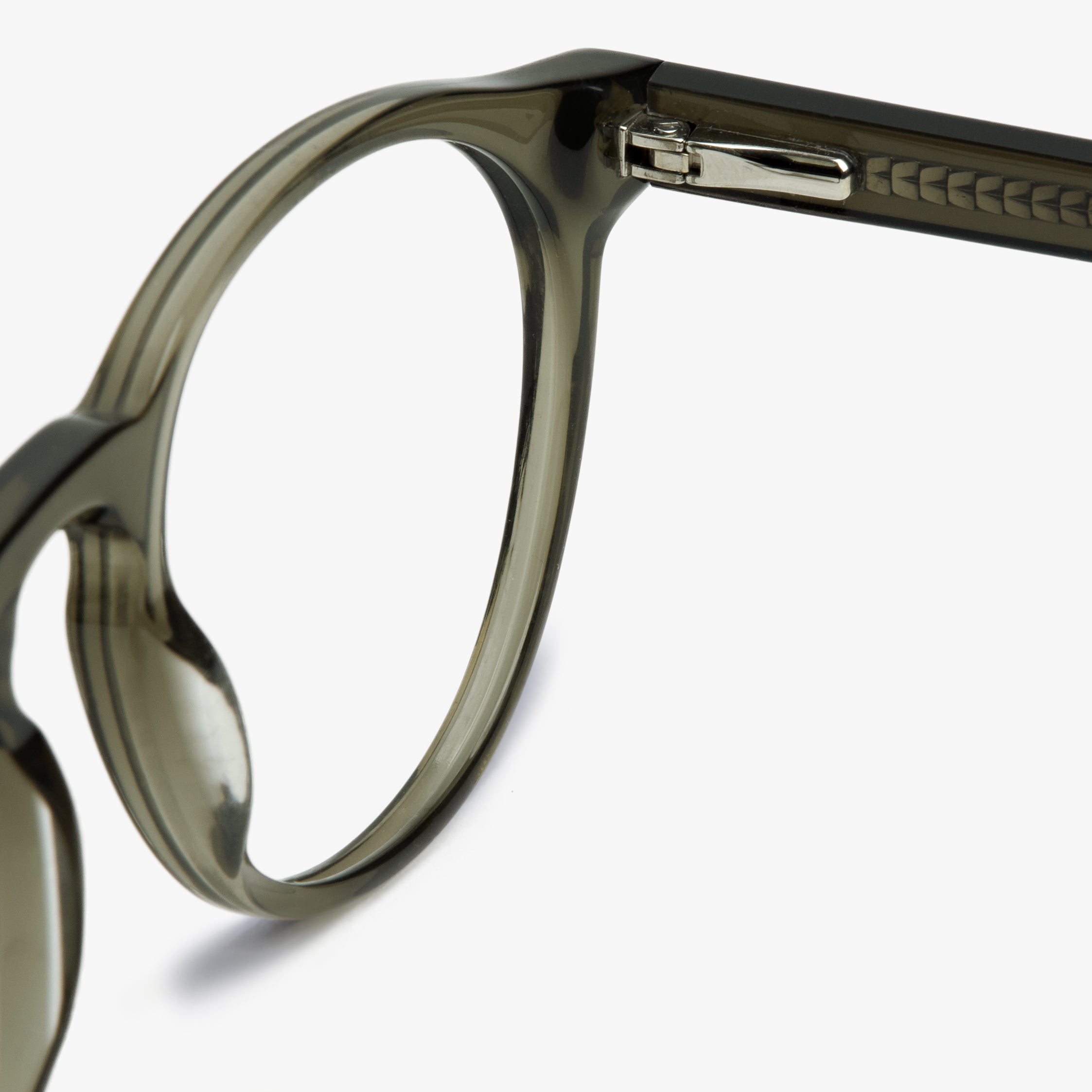 Close-up of shiny olive round glasses frame